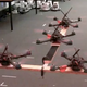 Image for article titled Quadrotor Flying Robots Team Up To Lift Objects
